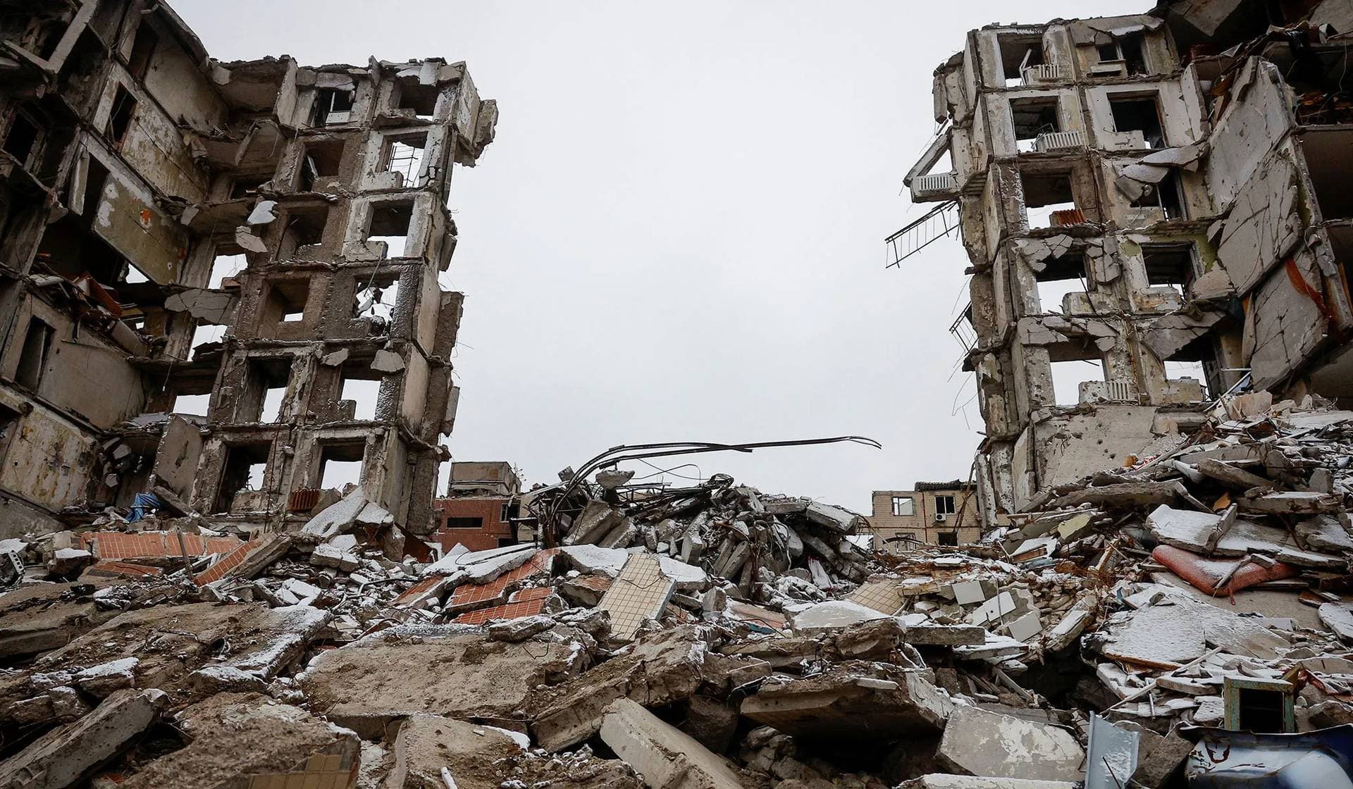 A destroyed multi-story residential building in Avdiivka