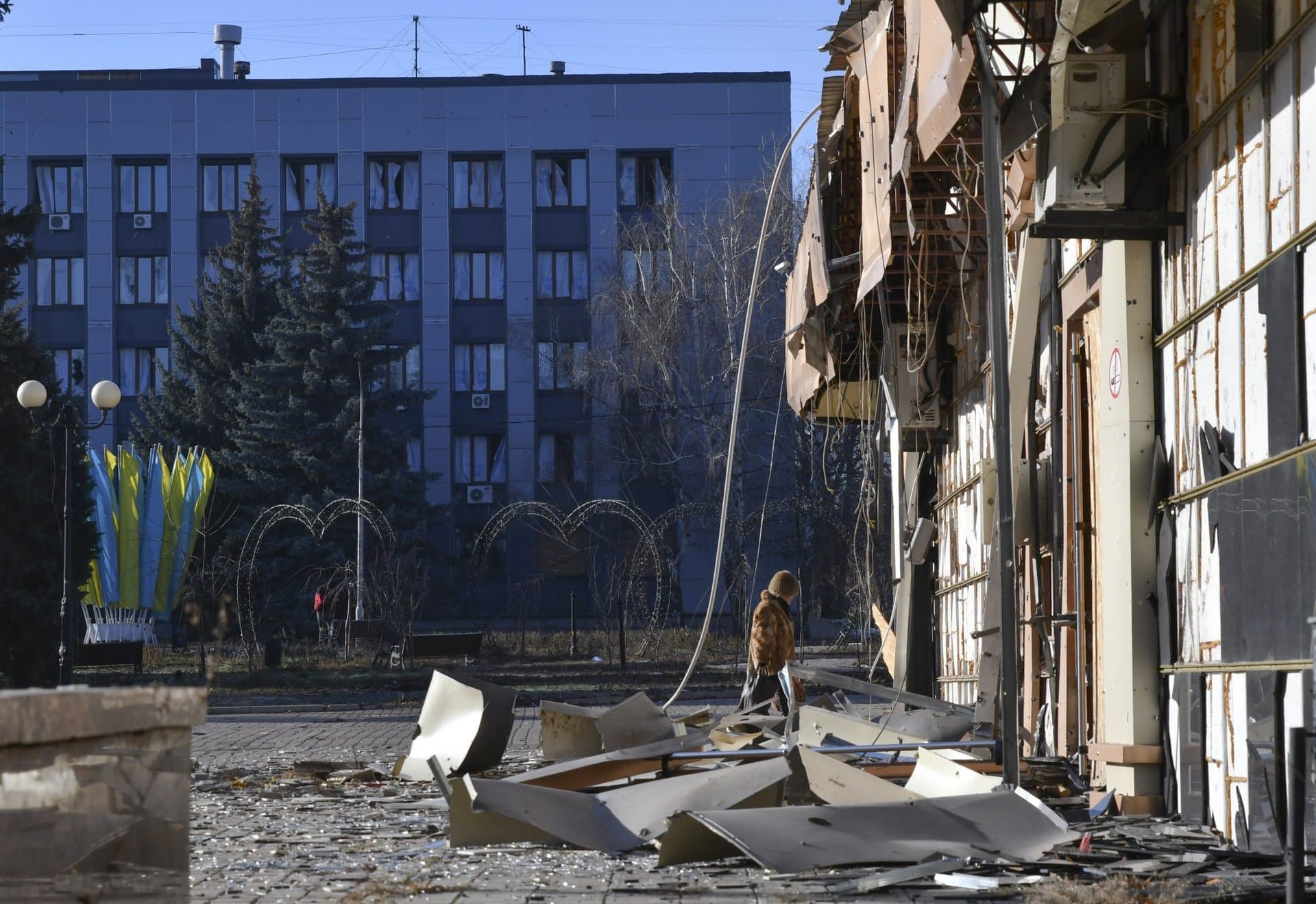 A local resident walks along a street in the area of the heaviest battles with the Russian invaders in Bakhmut