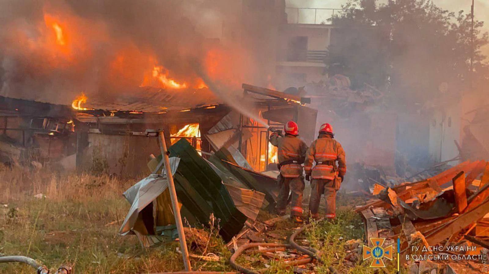 A firefighter works to contain the aftermath of a Russian attack in Zatoka
