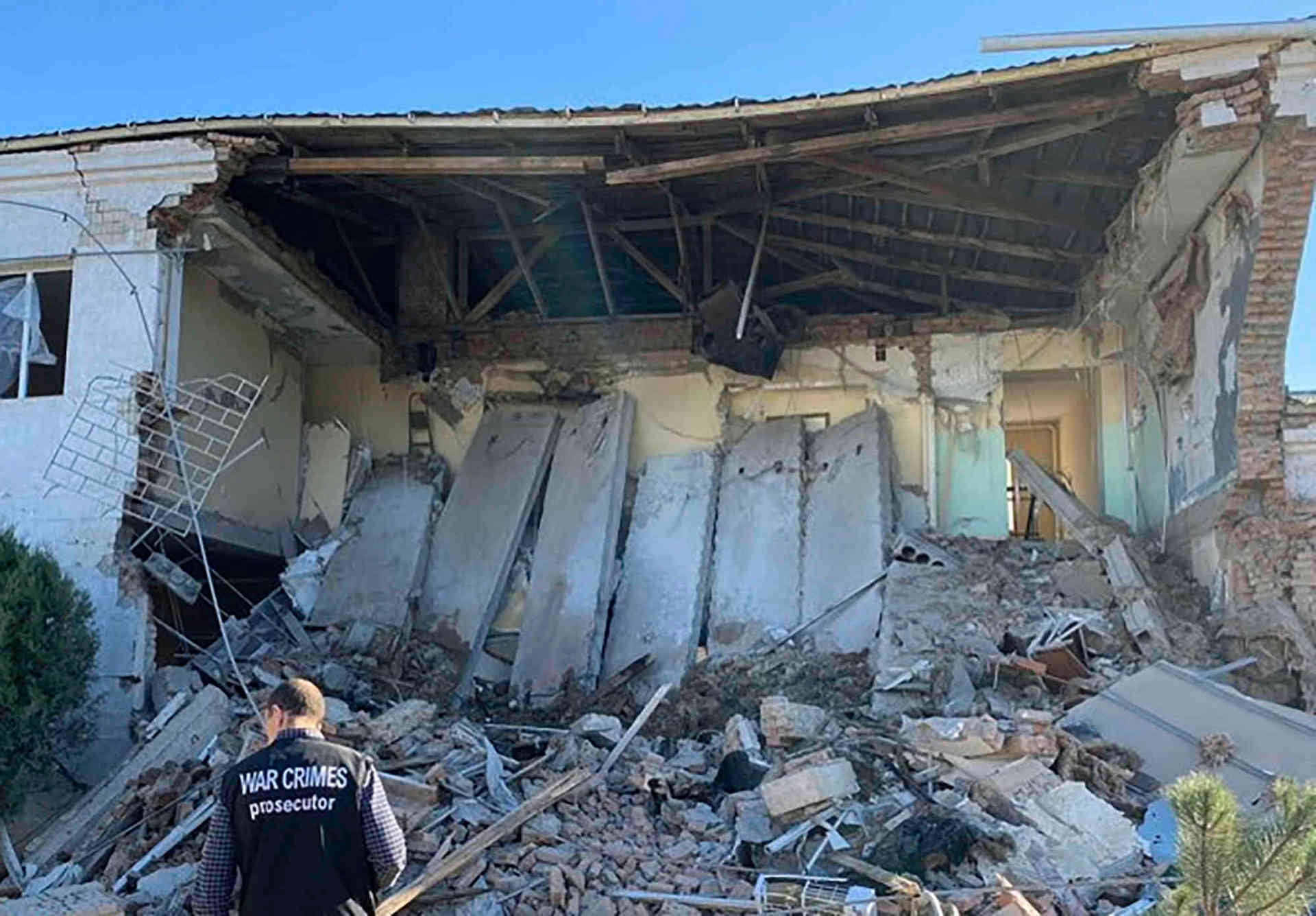 a war crimes prosecutor inspects the site of a night Russian drone attack on the near-port infrastructure in Izmail