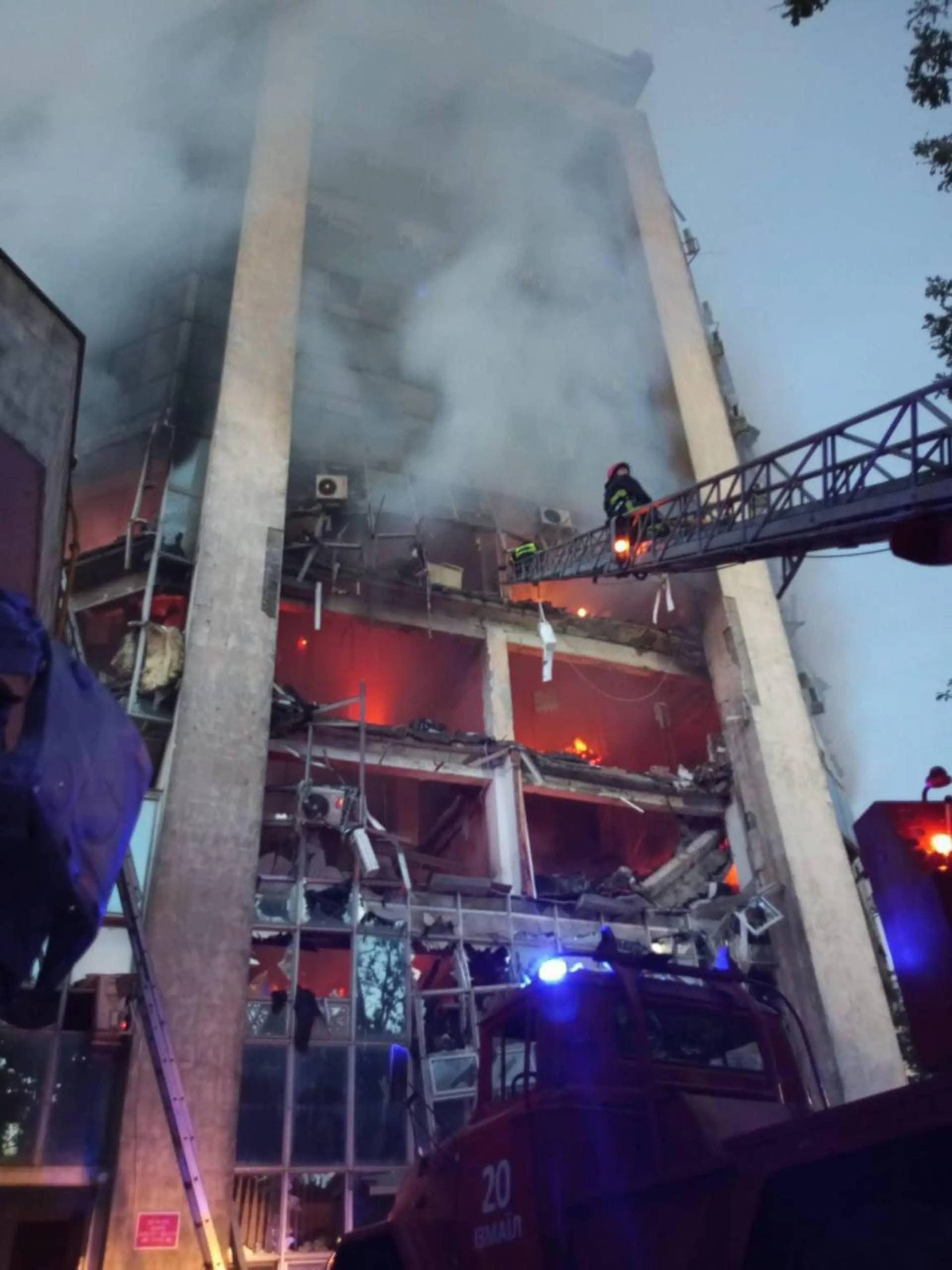 Rescuers work on a scene of drone attack in Odesa region, Ukraine