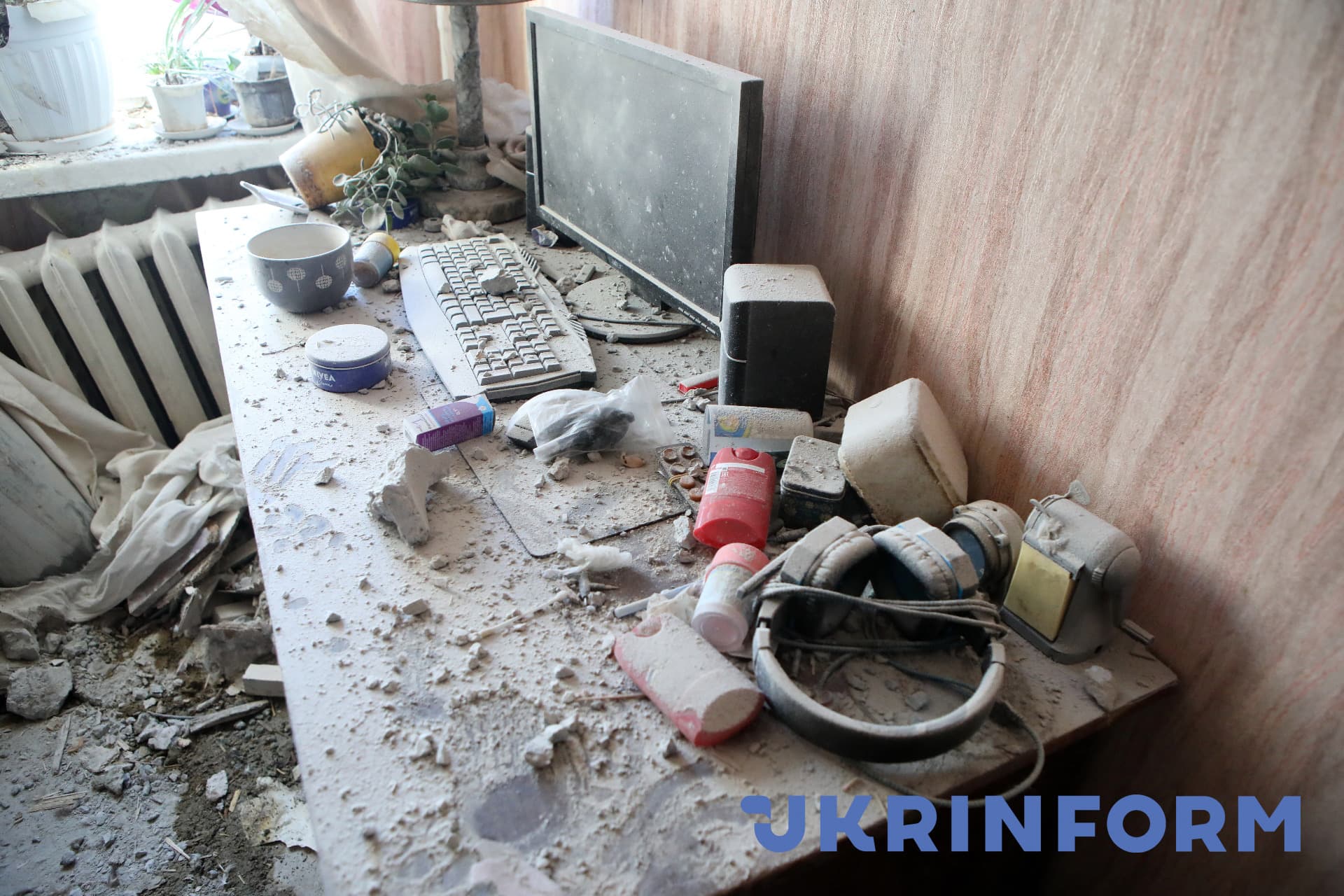 The consequences of shelling by Russian troops are seen in a residential area in Piatykhatky, Kharkiv, northeastern Ukraine