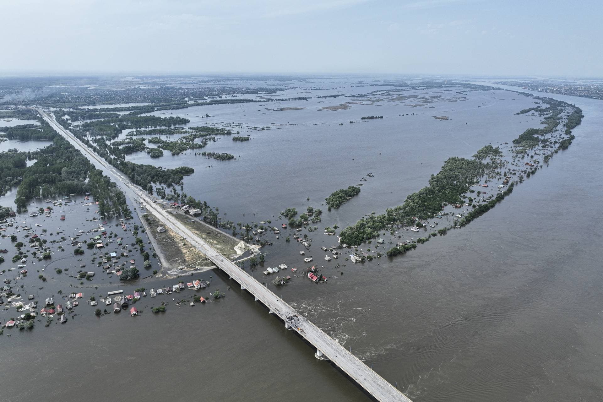 Houses are seen underwater in the flooded village near Kherson