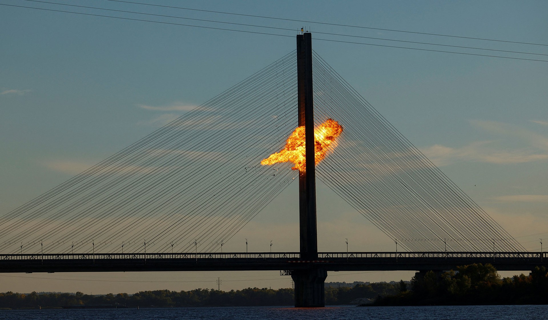 A Russian jet-powered drone strikes a bridge in Kyiv