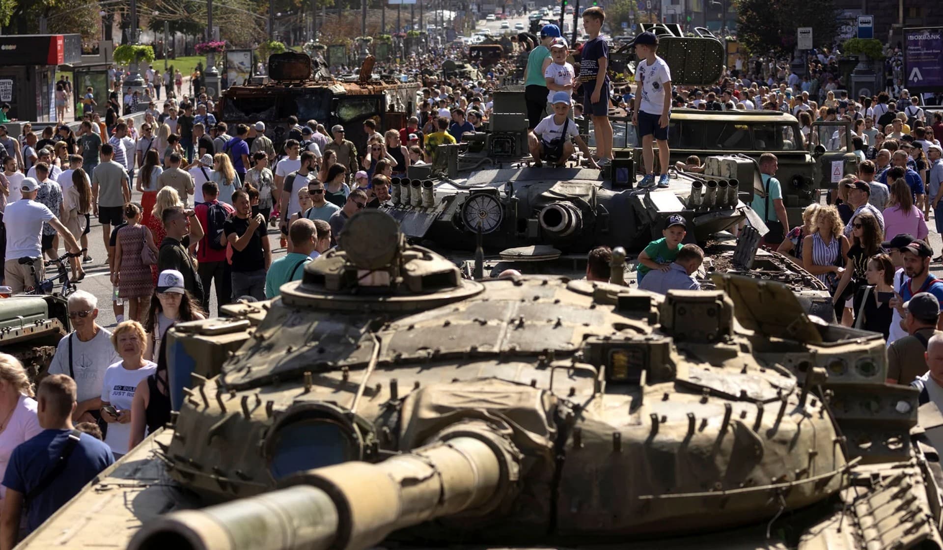 People visit an exhibition of destroyed Russian military vehicles and weapons in Kyiv