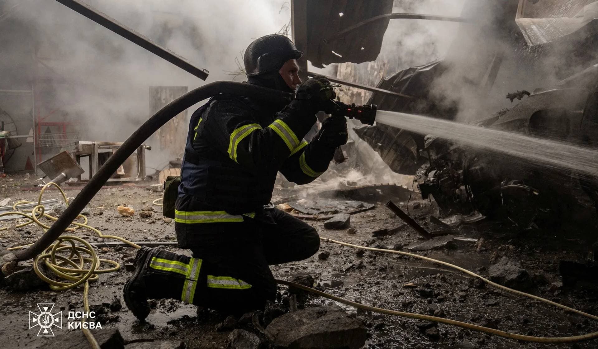 Rescuers work a site of a Russian missile attack in Kyiv