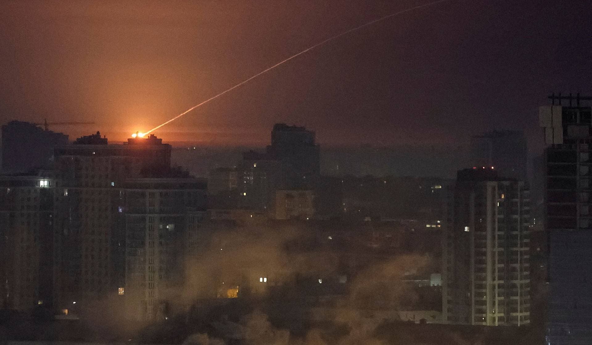 Ukrainian servicemen shoot down a Russian missile during a Russian missile and drone strike in Kyiv