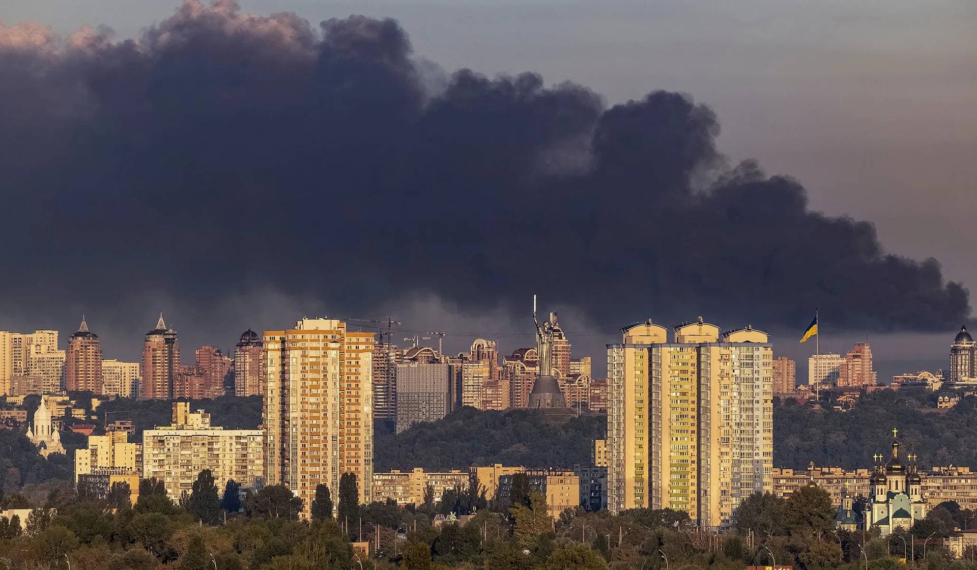 Smoke rises over the city after a Russian missile strike in Kyiv