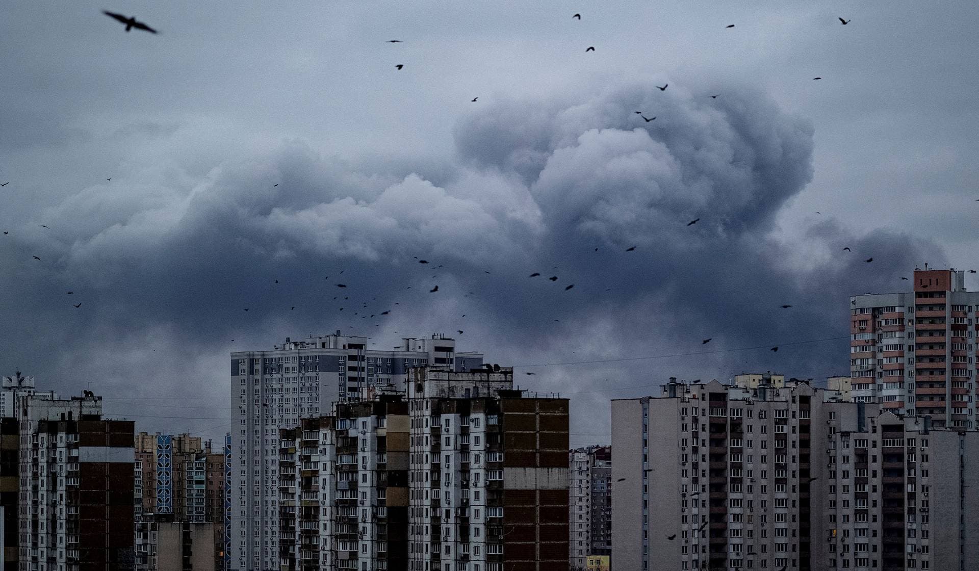Smoke rises in the city after Russian drone and missile strikes in Kyiv