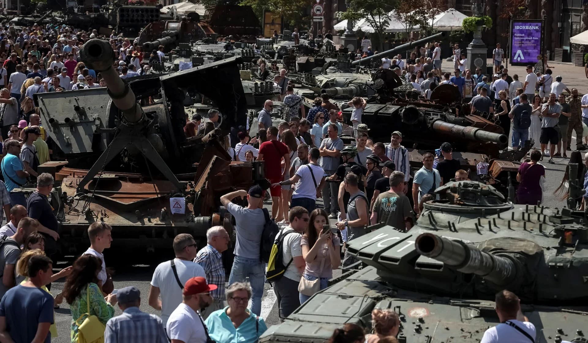 People visit an exhibition of destroyed Russian military vehicles and weapons in Kyiv