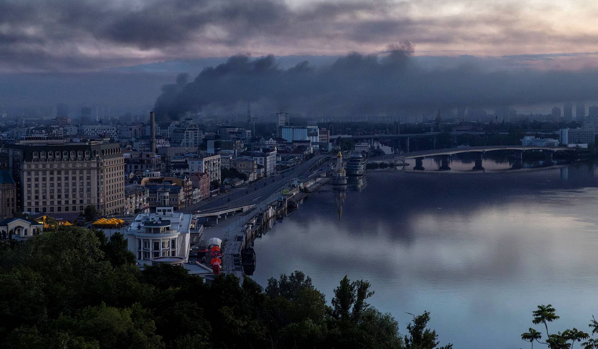Black smoke rises from the Podil neighborhood after overnight Russian missile and drone attacks in Kyiv