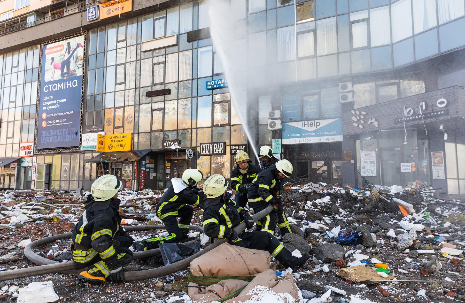 Rescue service works near a house destroyed by russian rocket in Kyiv