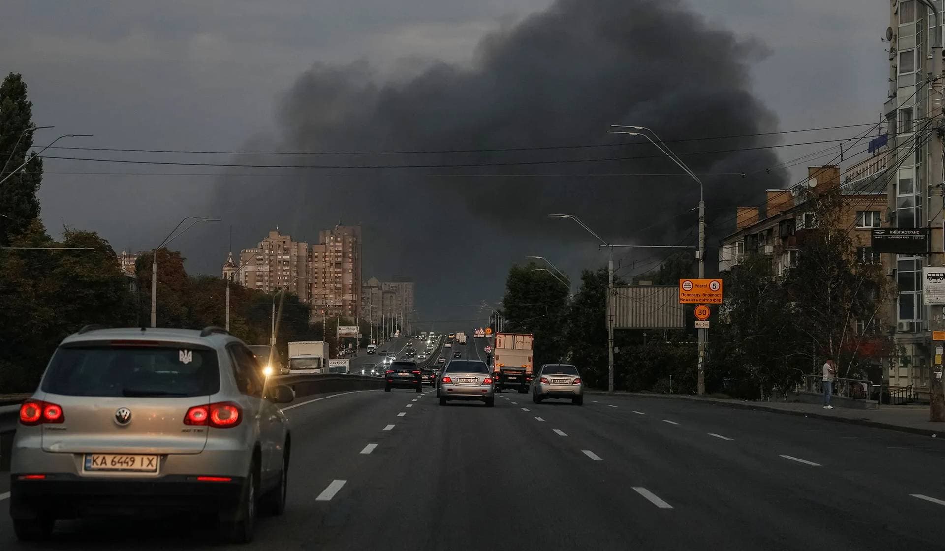 Smoke rises in the sky over the city after a Russian missile strike in Kyiv