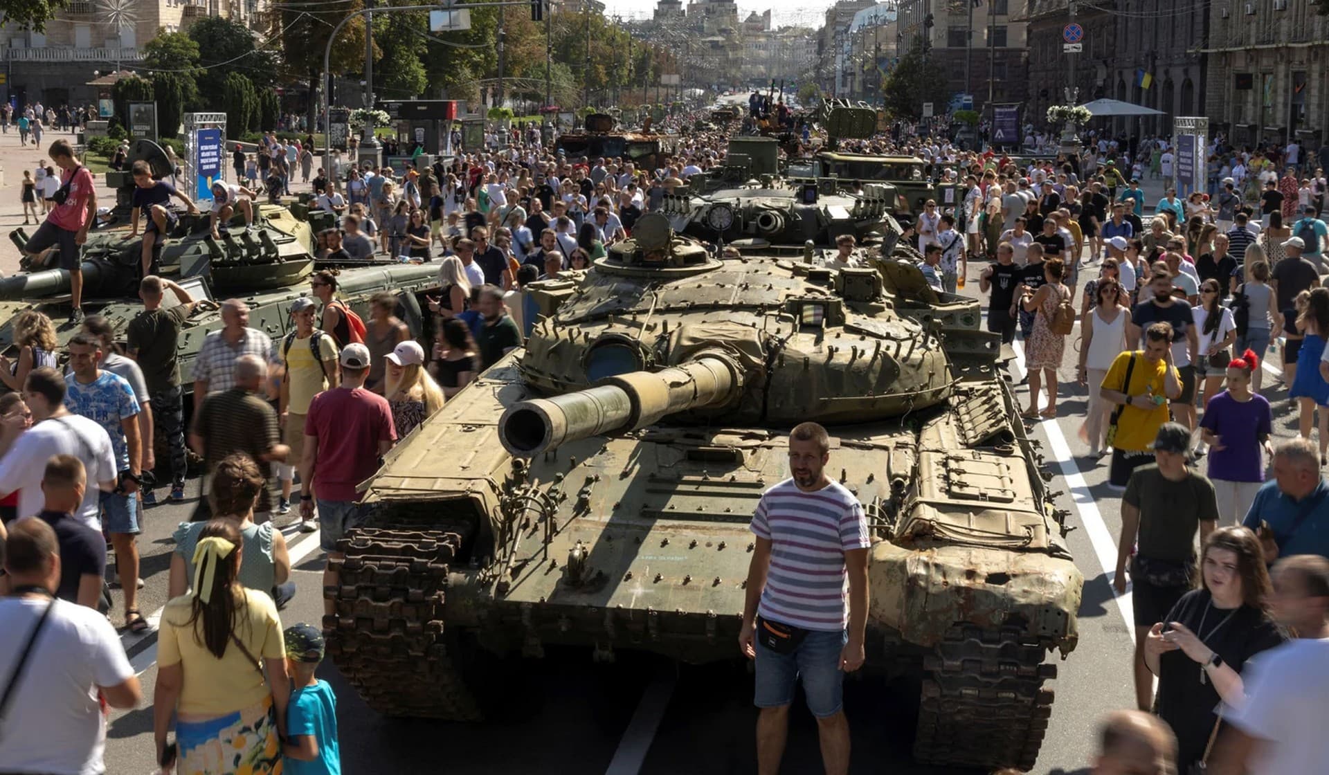 People visit an exhibition of destroyed Russian military vehicles and weapons in Kyiv