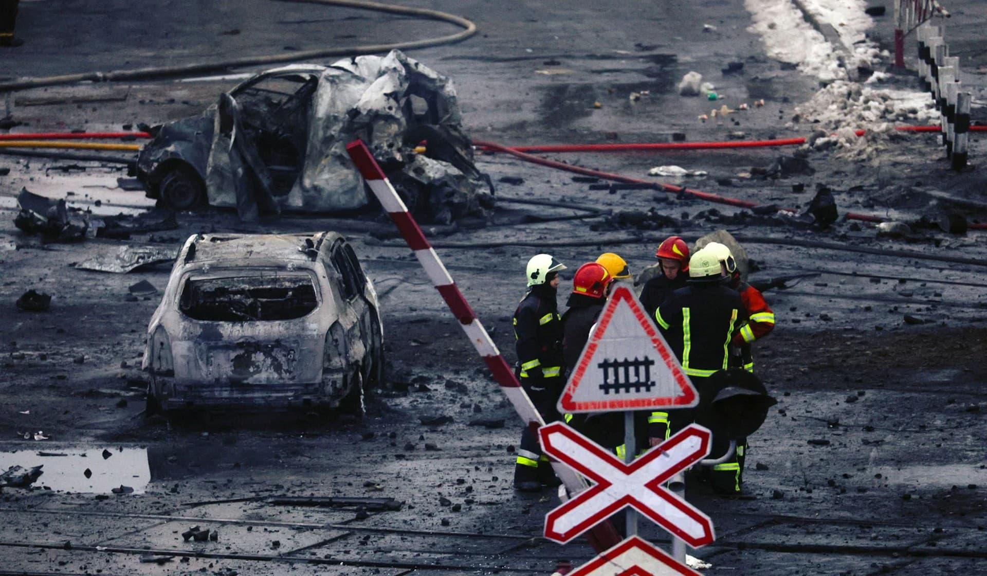 Rescuers work at a site of a Russian missile strike in Kyiv