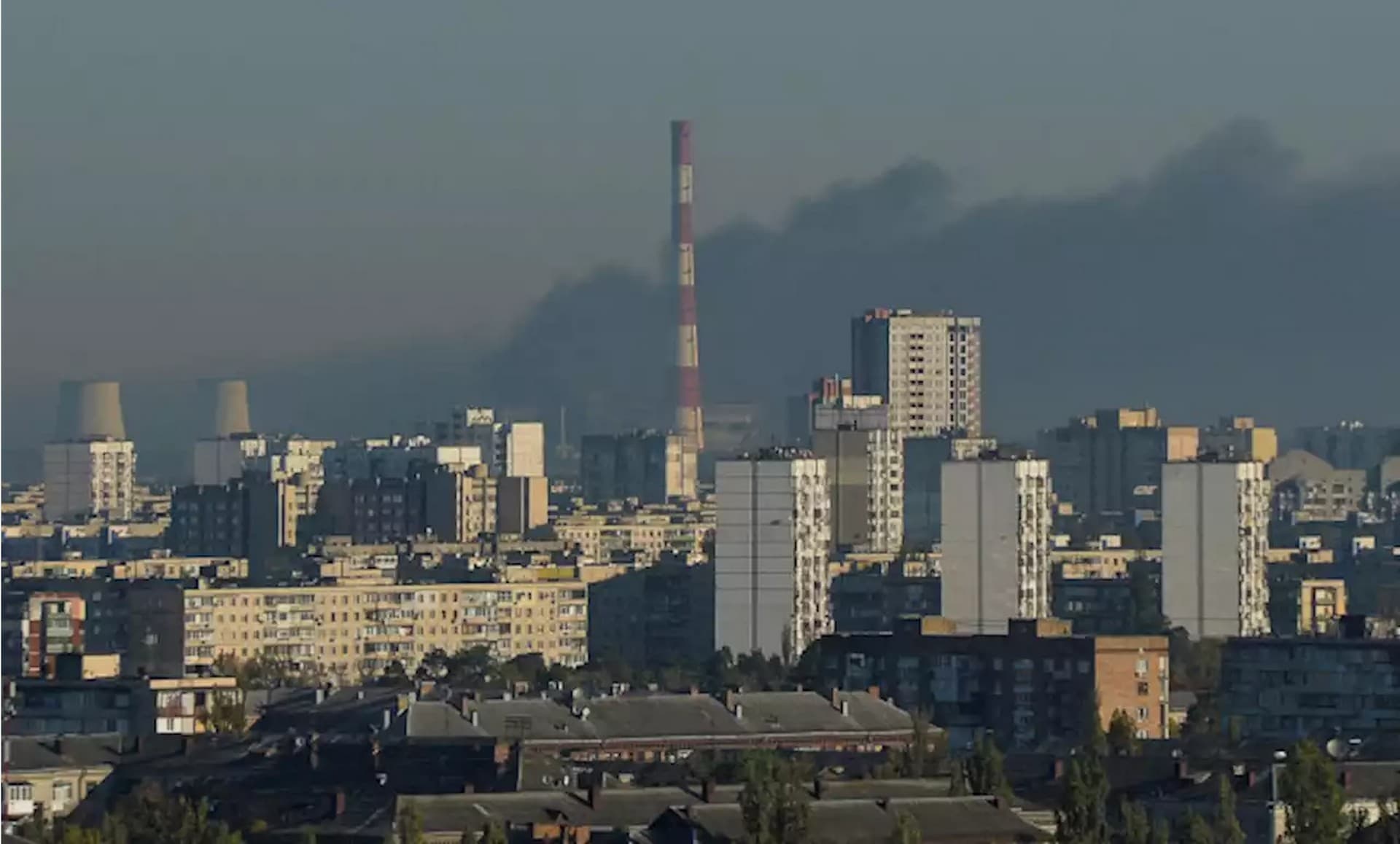 Smokes rises on the outskirts of the city during a Russian missile attack in Kyiv
