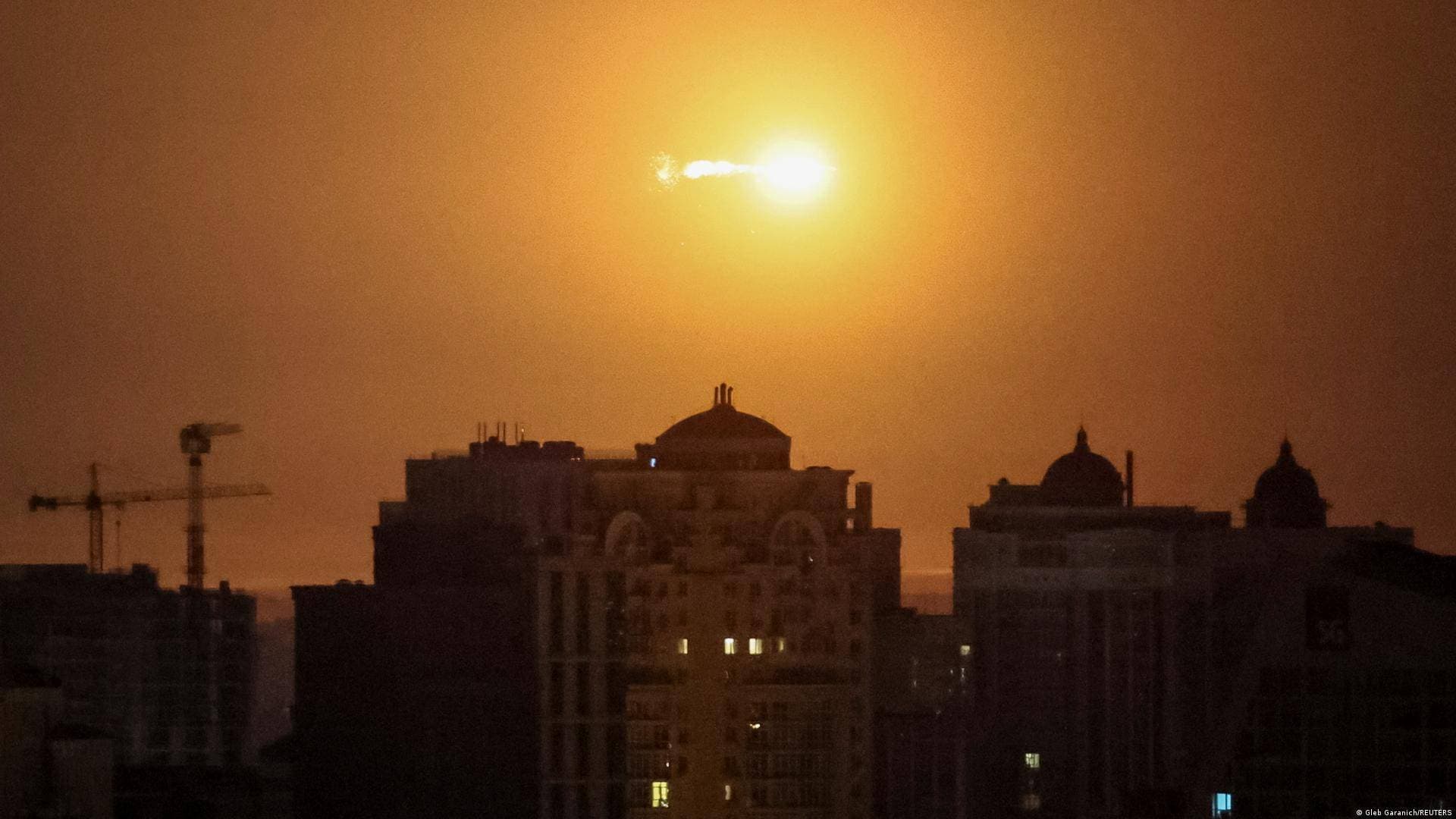 An explosion of a missile in the sky over the city during a Russian missile strike in Kyiv