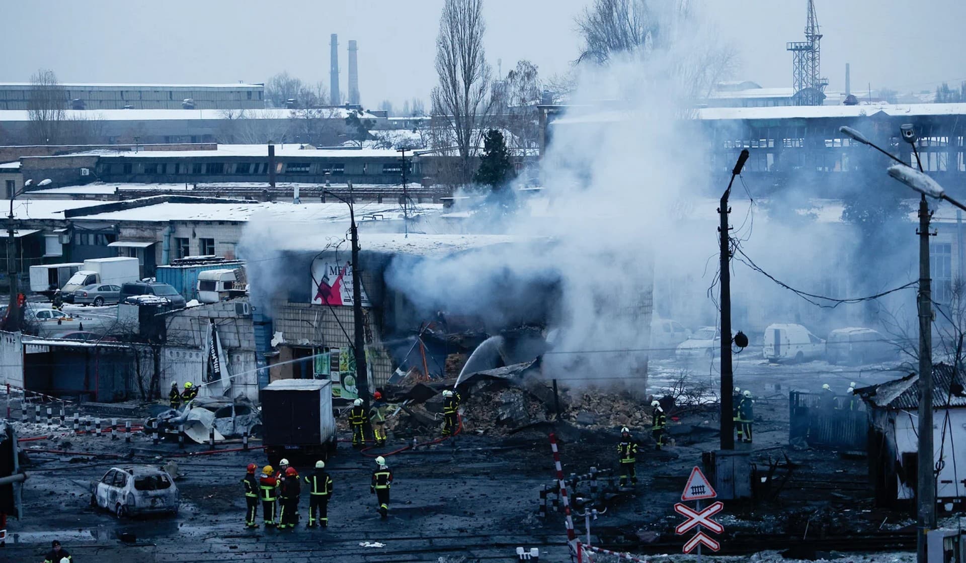 Rescuers work at a site of a Russian missile strike in Kyiv