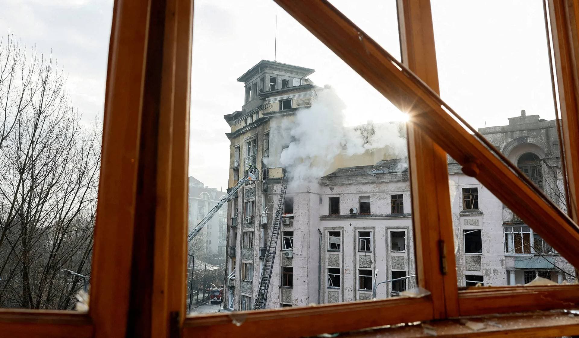 A rescuer works at a site of a building damaged during a Russian missile strike in Kyiv