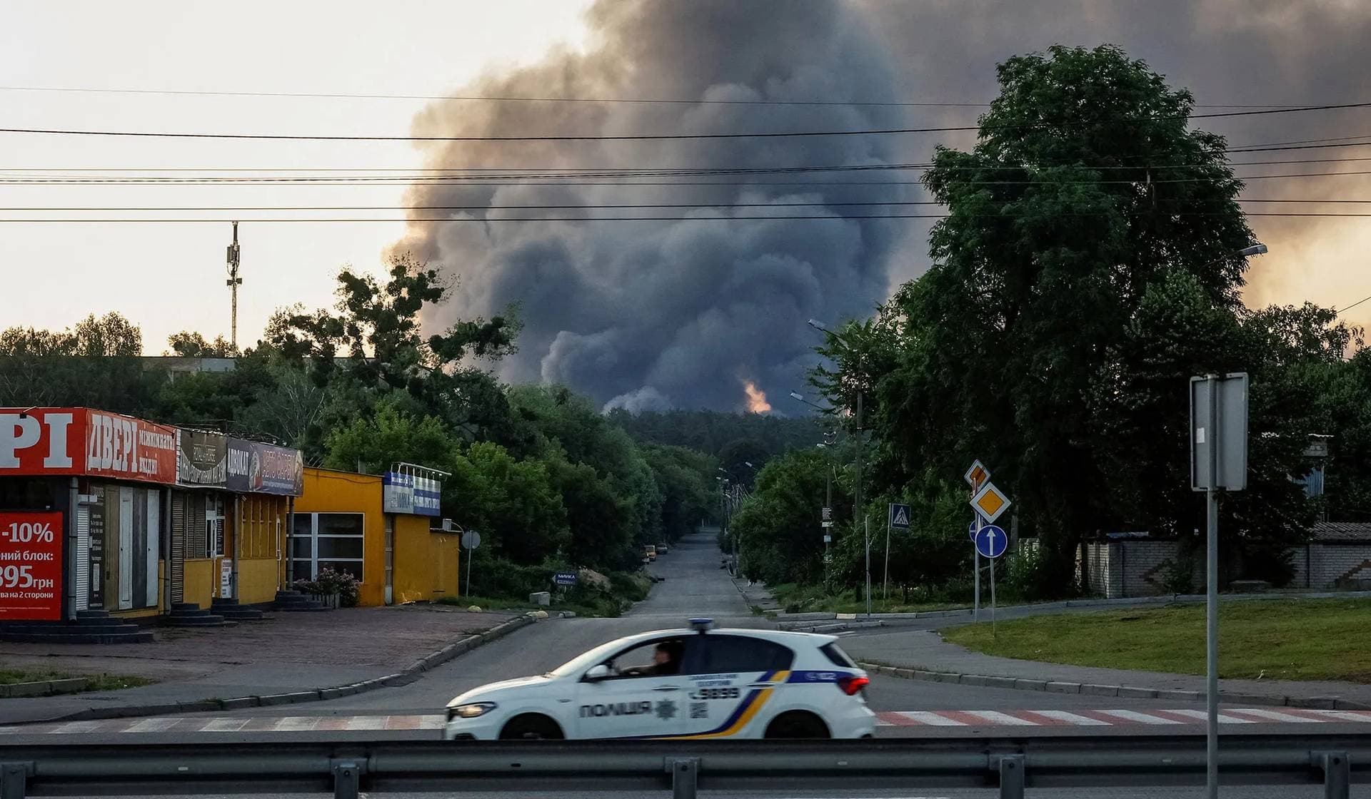 Smoke visible from the outskirts of the city after a Russian drone and missile strike in Kyiv