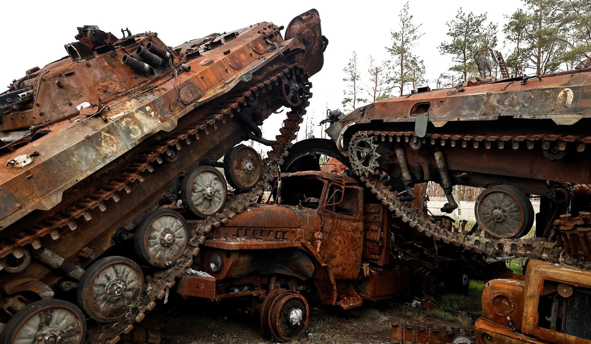 Destroyed Russian tanks and armored vehicles in the recently liberated town of Lyman