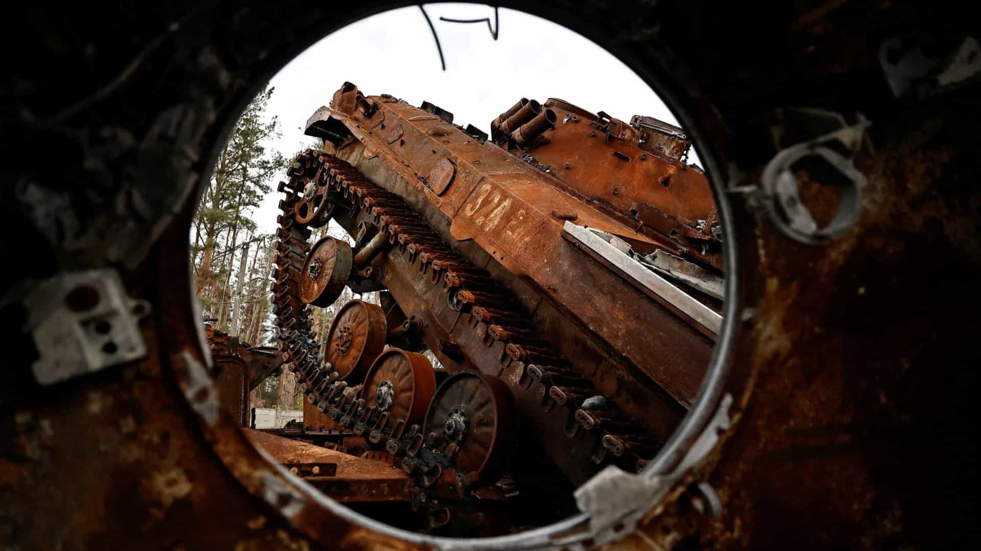 Destroyed Russian tanks and armored vehicles in the recently liberated town of Lyman
