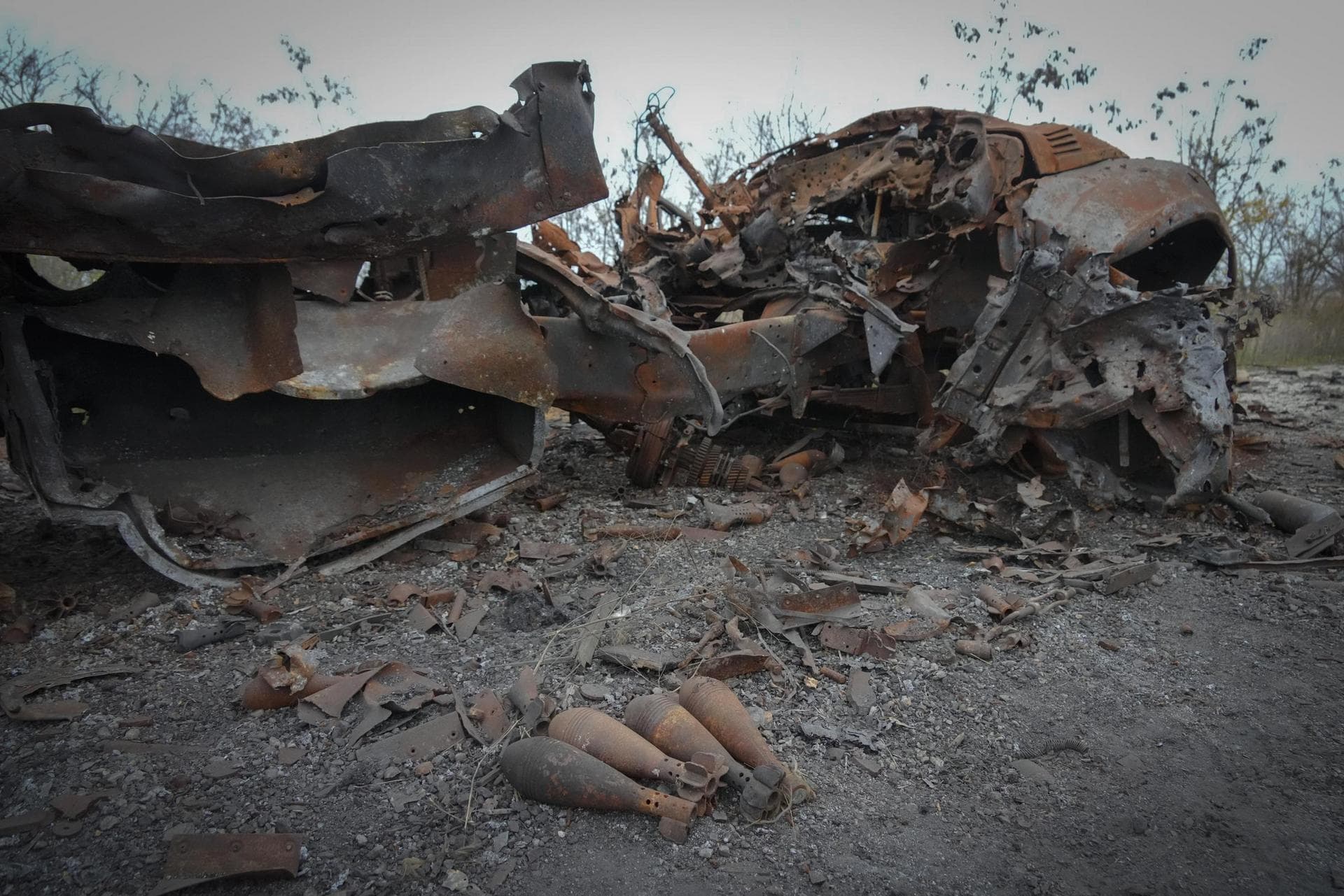 The gutted remains of military vehicles lie on the road after heavy battles between Ukrainian troops and Russian invaders in Mykolaiv region
