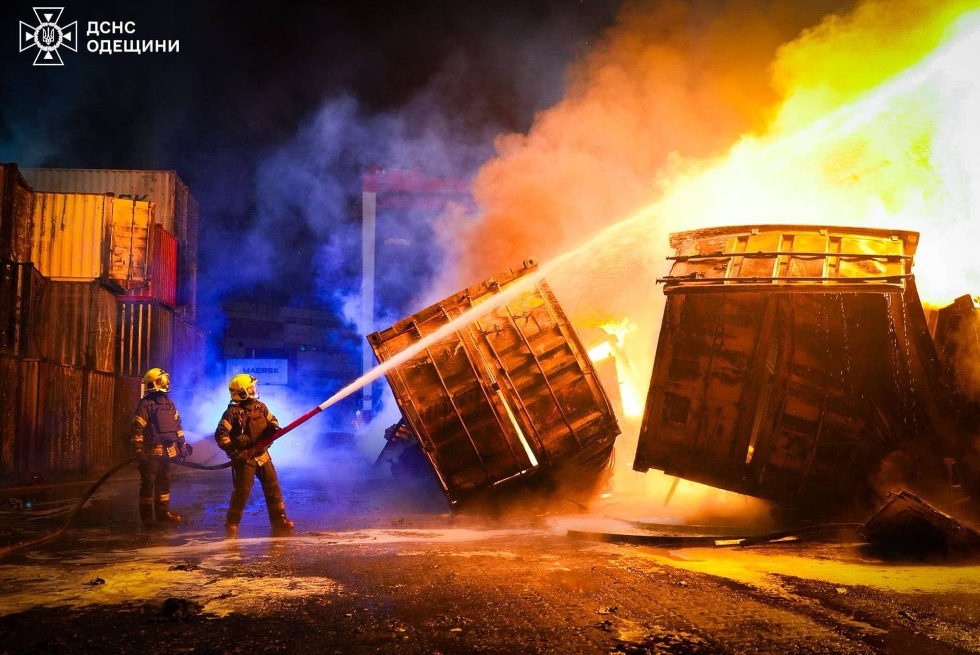 Firefighters work at the site of a Russian drone strike in Odesa Region