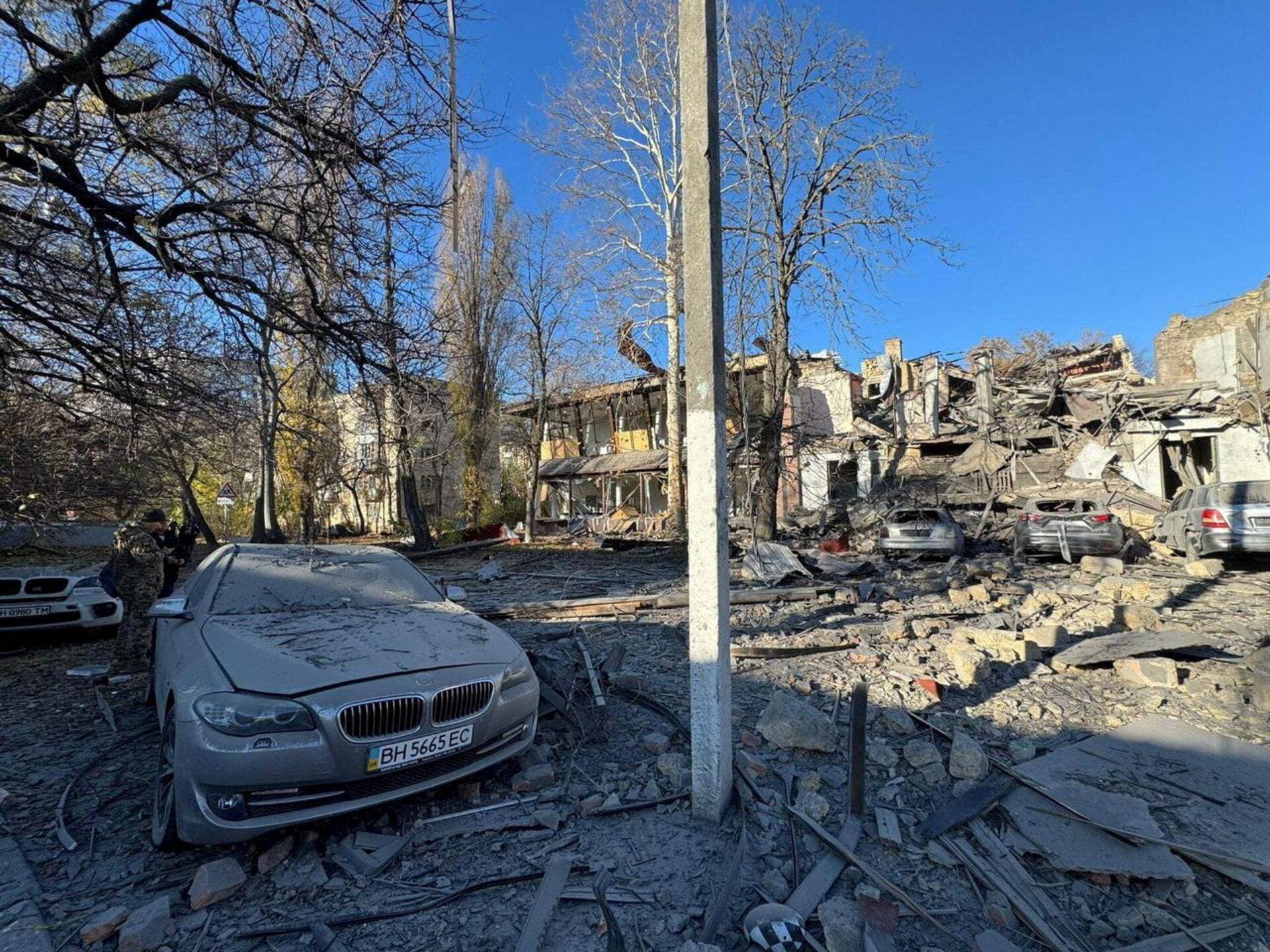 Buildings and cars heavily damaged by a Russian missile strike in Odesa