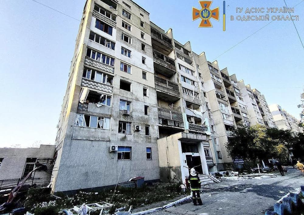 a damaged residential building is seen in Odesa