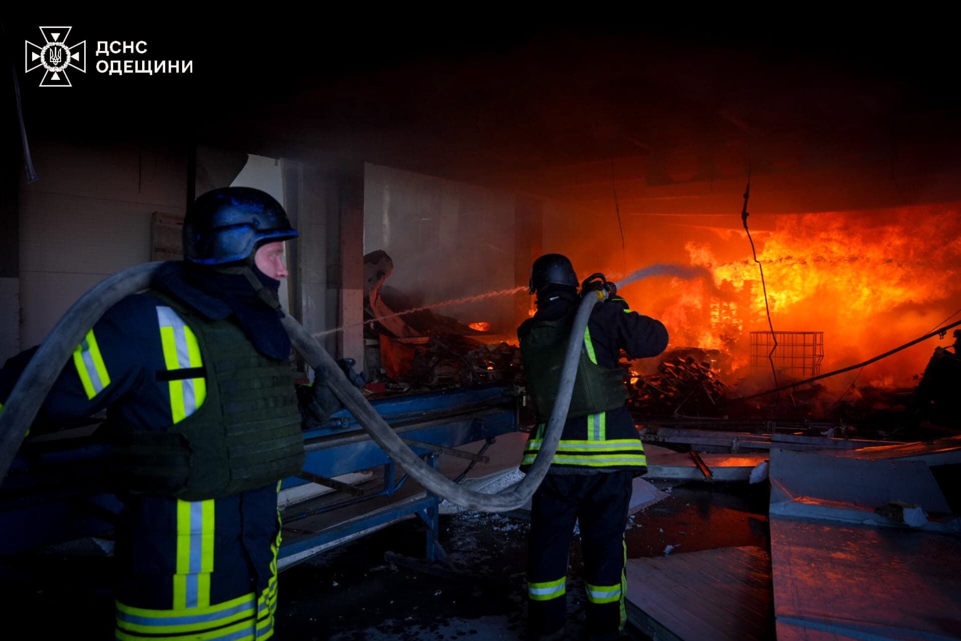 Firefighters work at a site of a Russian missile strike near Odesa