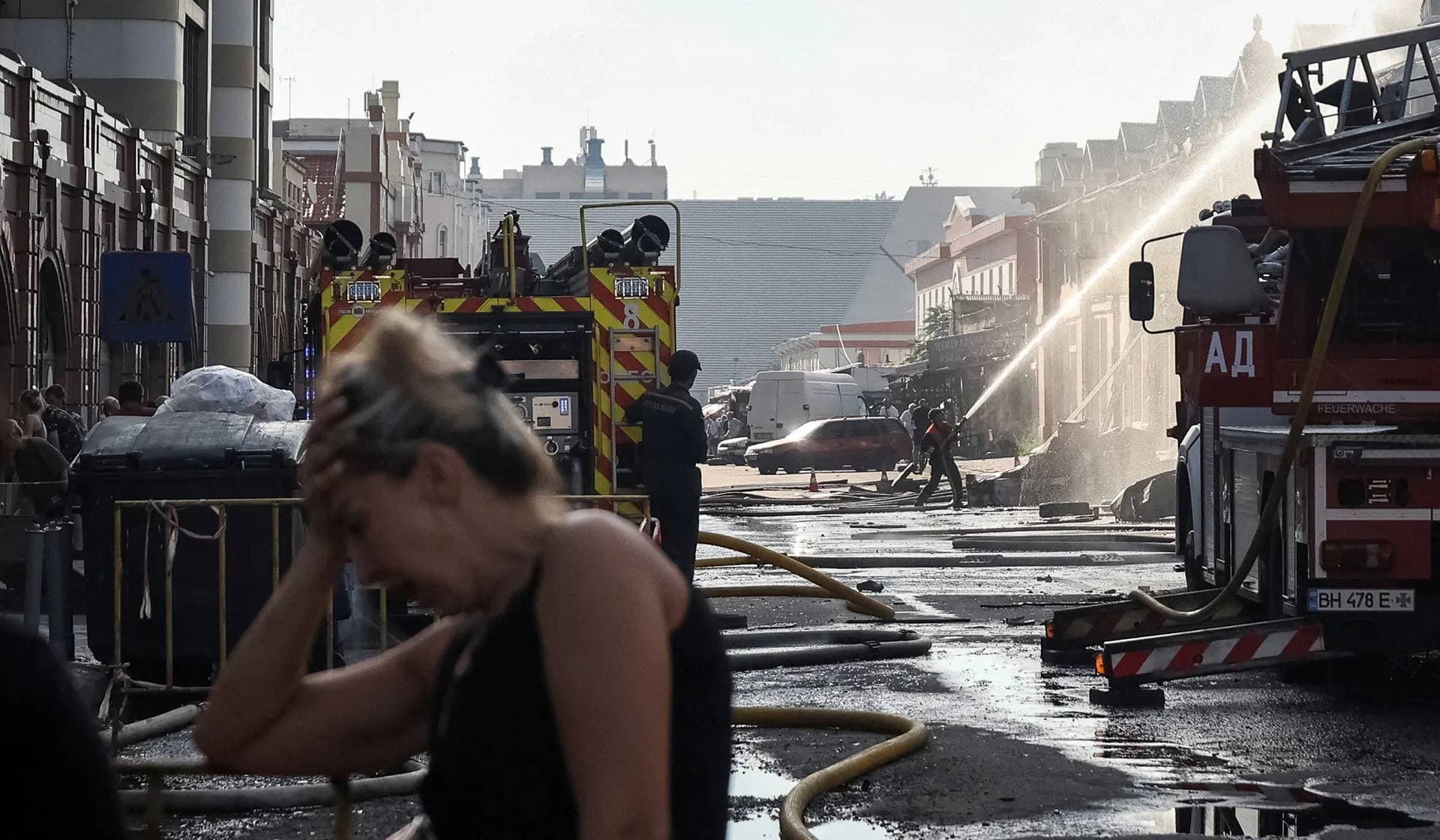 Firefighters work at the site of the Russian drone strike in Odesa