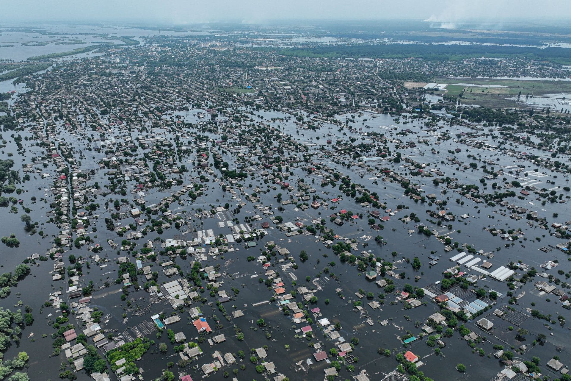 Houses are seen underwater in the flooded town of Oleshky