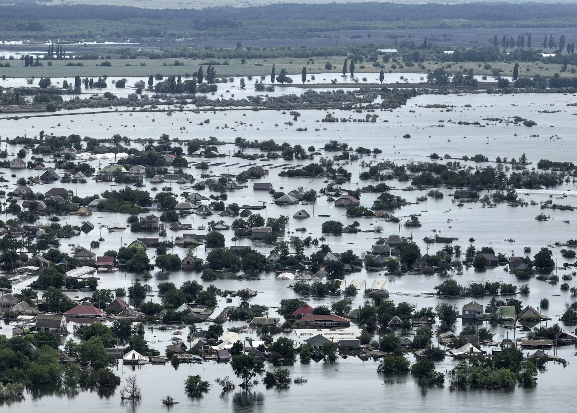 Houses are seen underwater in the flooded town of Oleshky