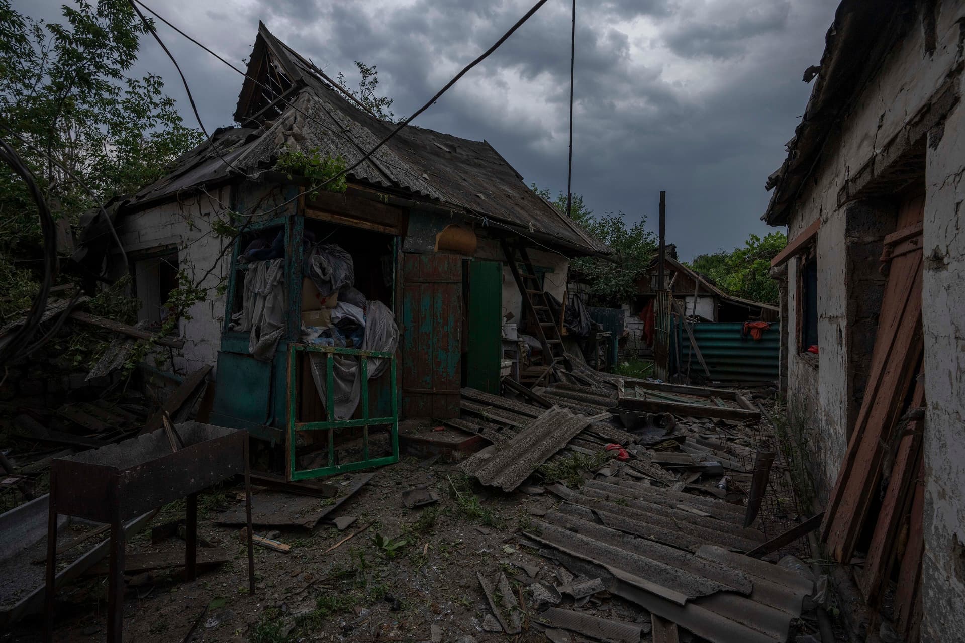 Damaged houses in the aftermath of a Russian rocket attack, on the outskirts of Pokrovsk