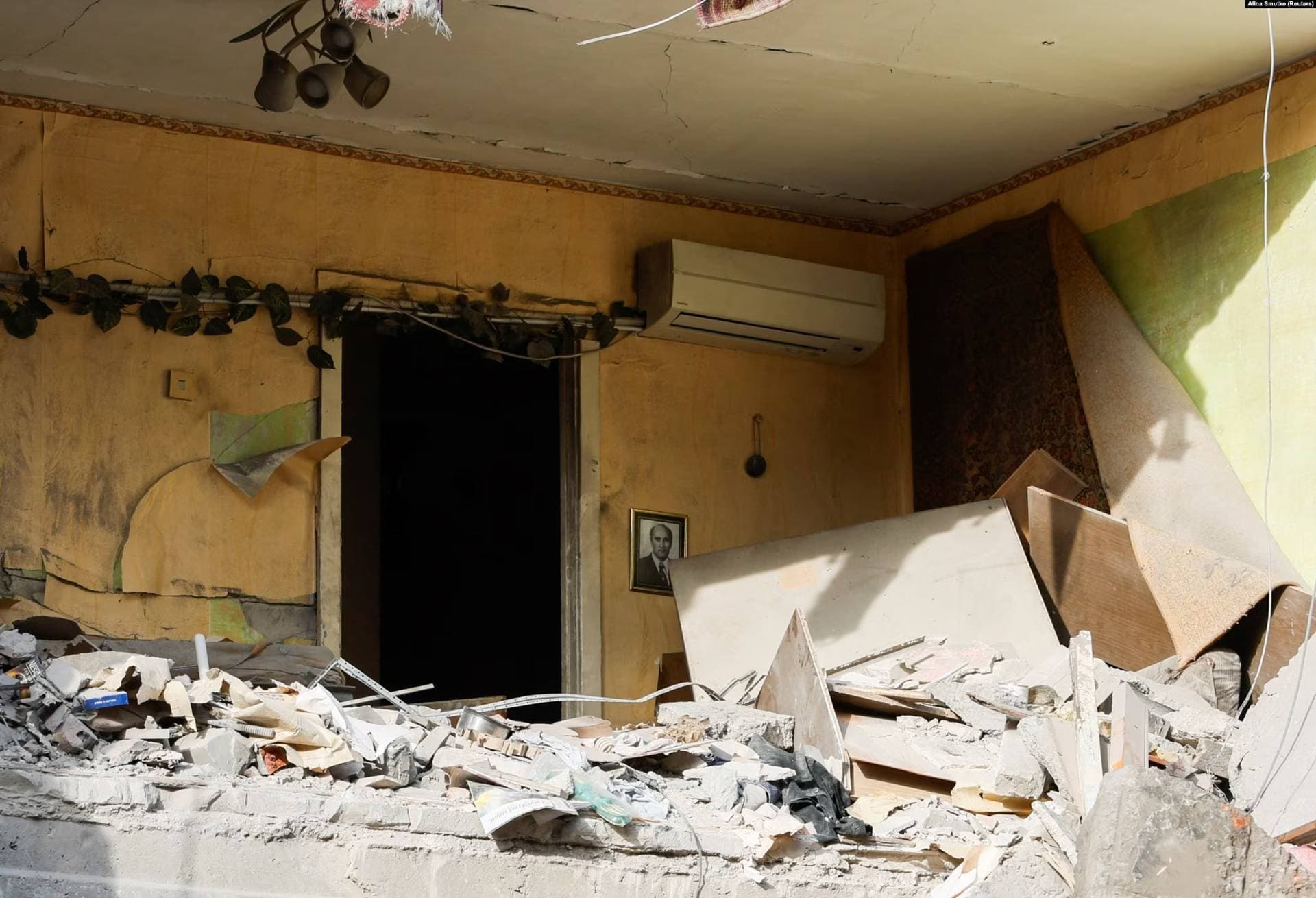 the aftermath of a Russian missile strike on an apartment block in the eastern Ukrainian town of Selydove