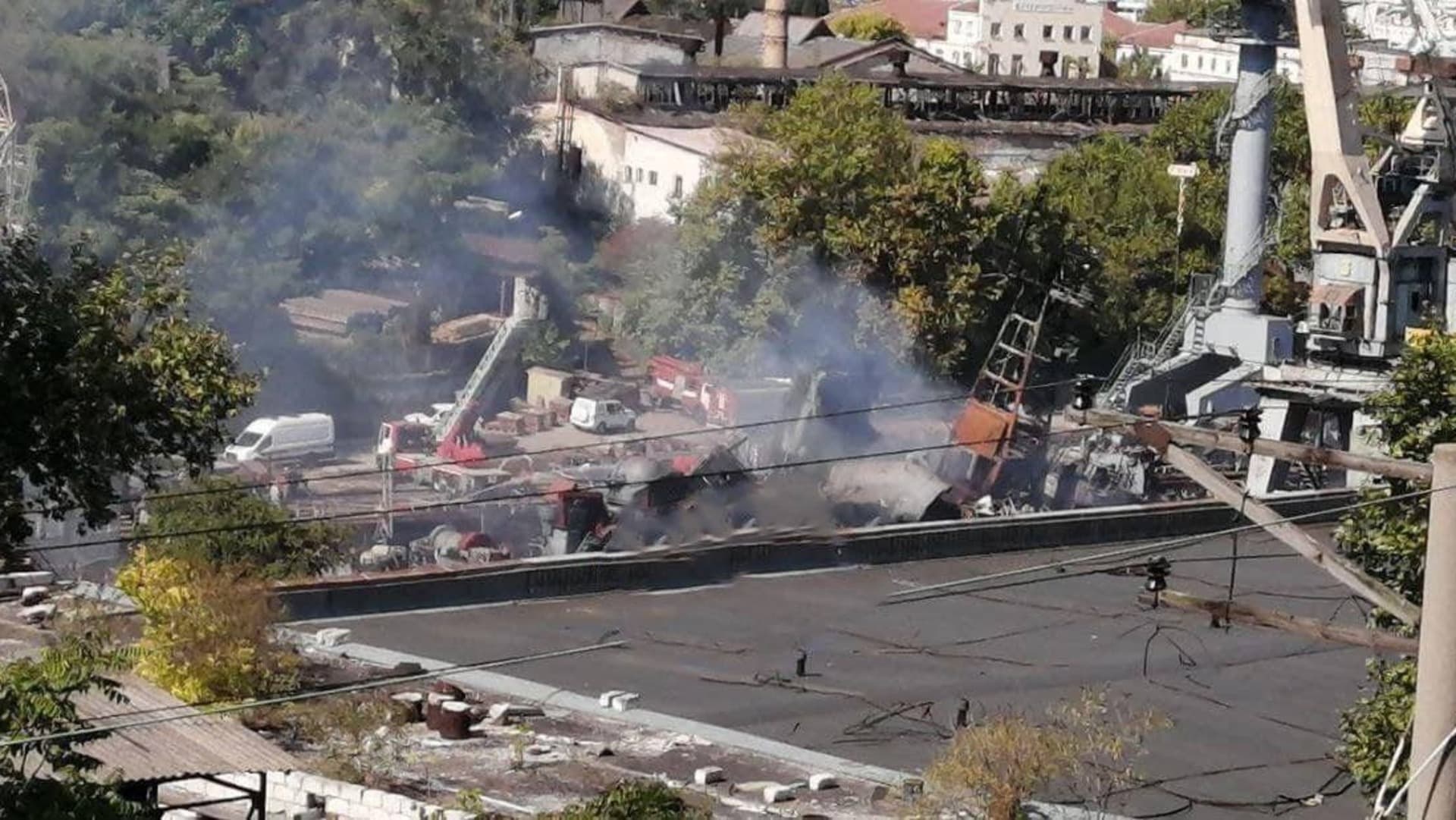 Smoke billows from a damaged Russian ship after the Ukrainian missile attack on Sevastopol.