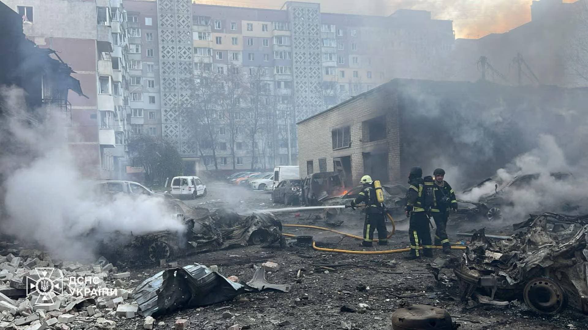 Rescuers work at the site of the apartment building hit by a morning Russian missile strike in Ternopil