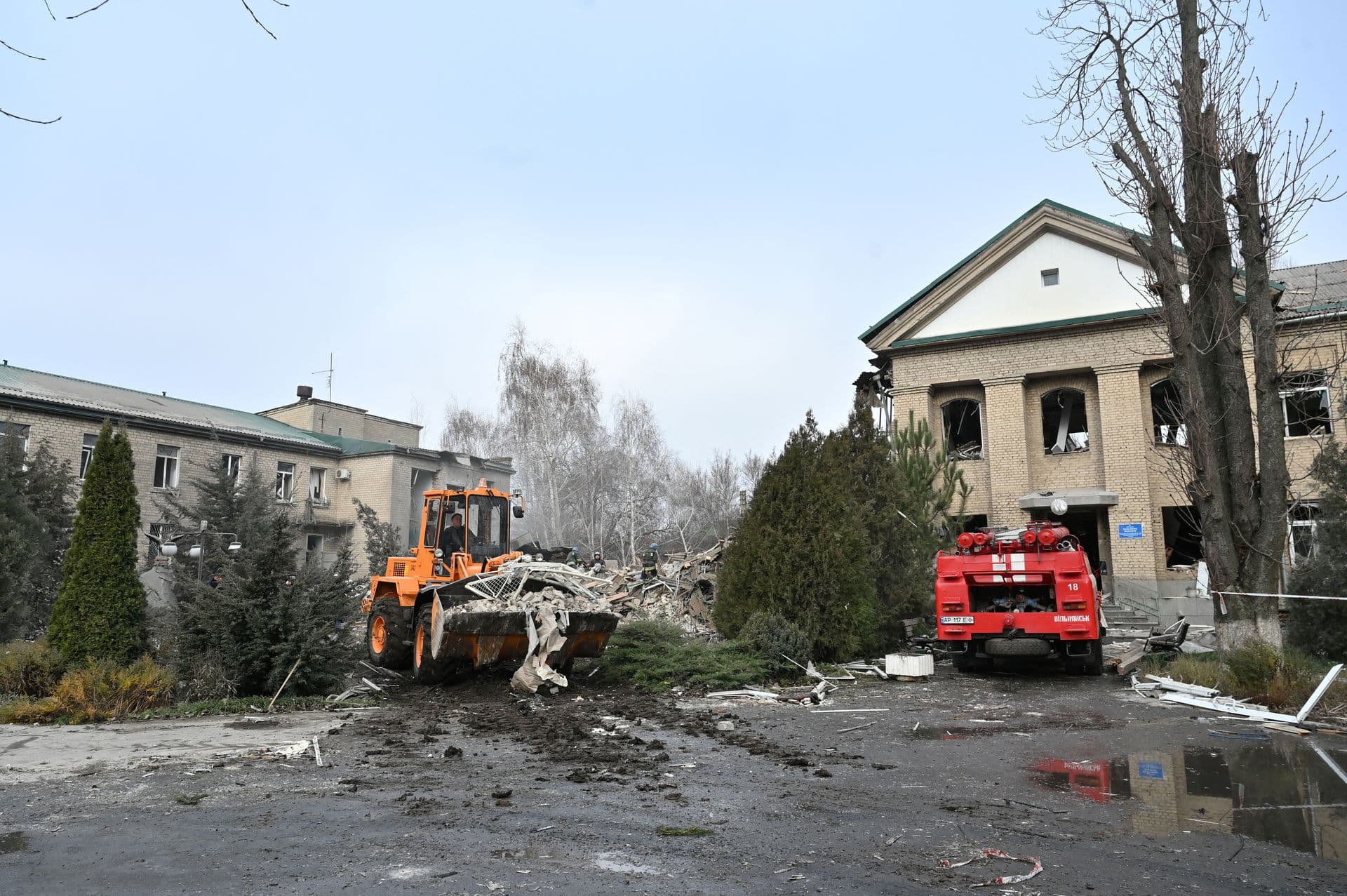 Rescuers work at the site of a maternity ward of a hospital destroyed by a Russian missile attack in Vilniansk