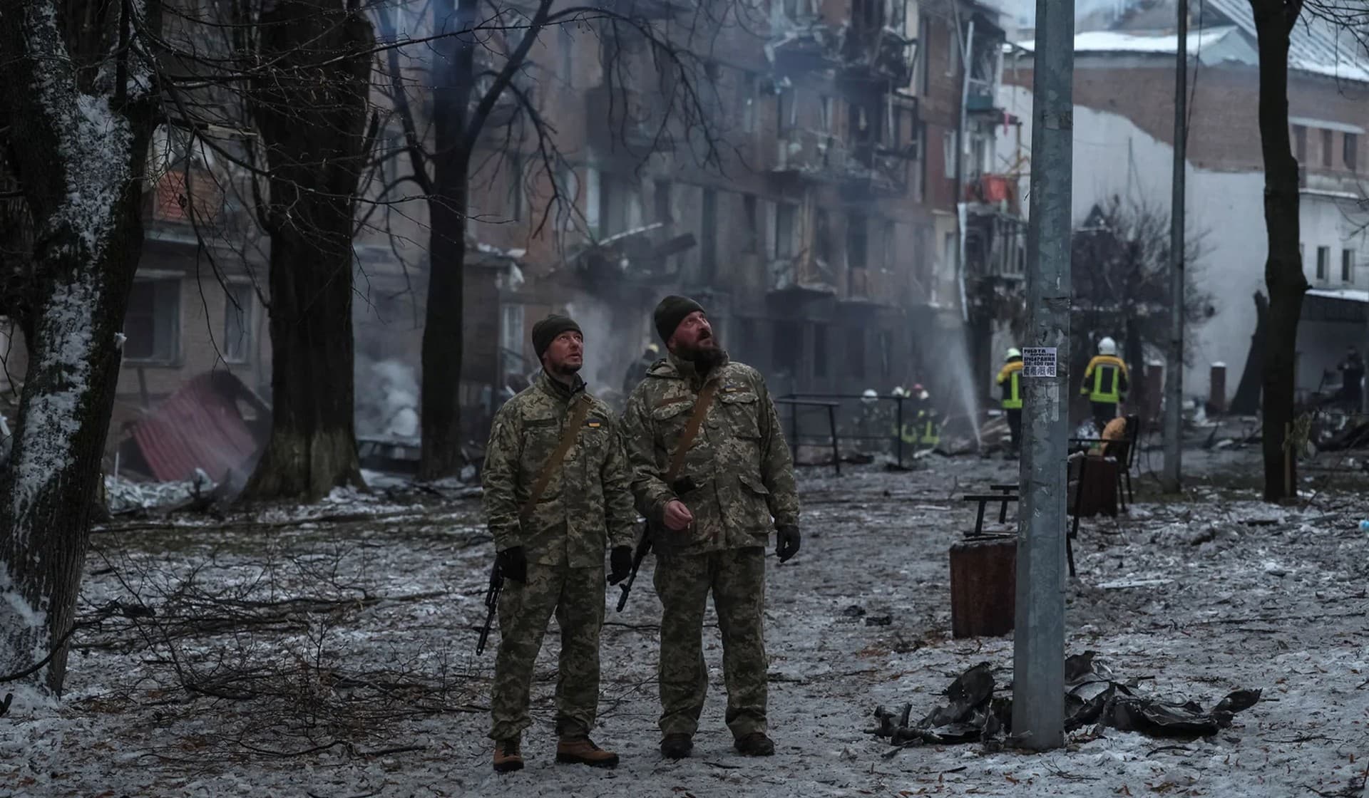 Rescuers work at a site of a residential building destroyed by a Russian missile attack in Vyshhorod