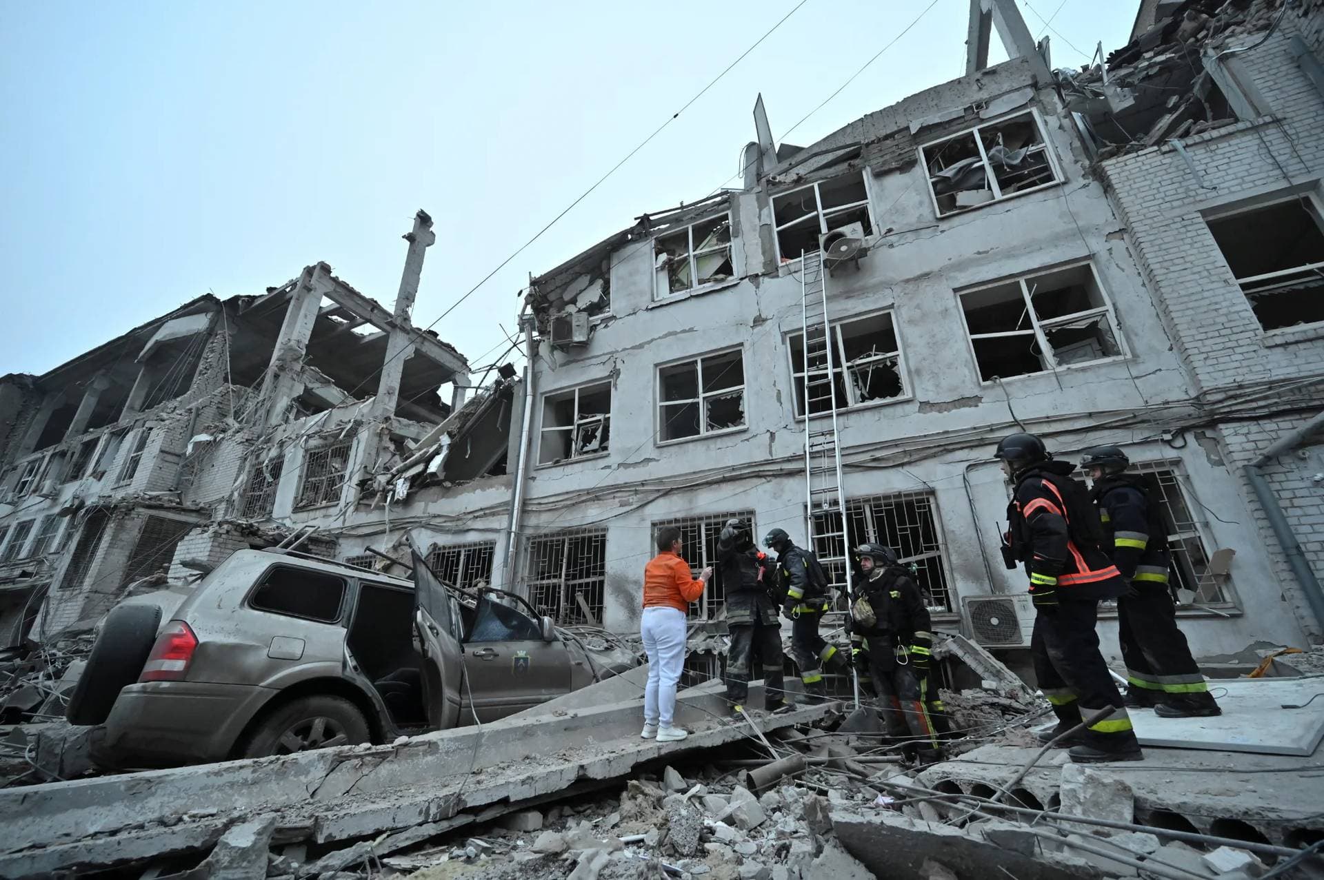 Rescuers work at the site where a building was heavily damaged by a Russian missile strike in Zaporizhzhia